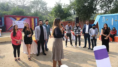 A batch of alumni posing together for a photo