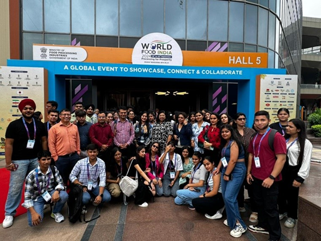 hotel management students at exhibition